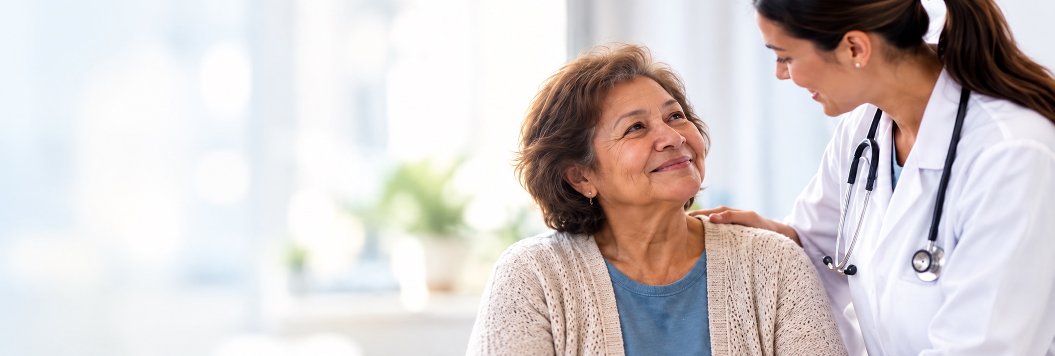 A clinician speaking warmly with a patient